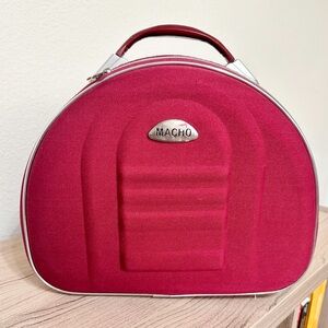 Makeup/ Toiletry bag. Maroon in color.